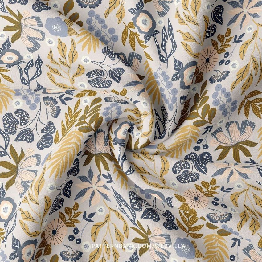 Double brushed polyester fabric mockup featuring a beige base with intricate floral and leaf patterns in muted blue and gold tones.