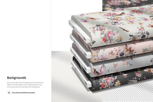 Five fabric bolts arranged in a pile, each featuring different floral and butterfly designs, displayed in a PSD mockup scene.