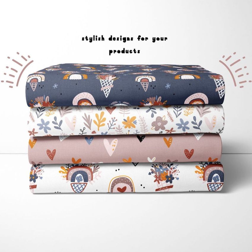 Folded fabrics mockup featuring four stacked textiles with whimsical boho patterns, seen from the front on a white surface.