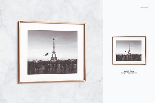 Thin metallic frame mockup with a black and white photo of the Eiffel Tower, shown on a light marble wall.