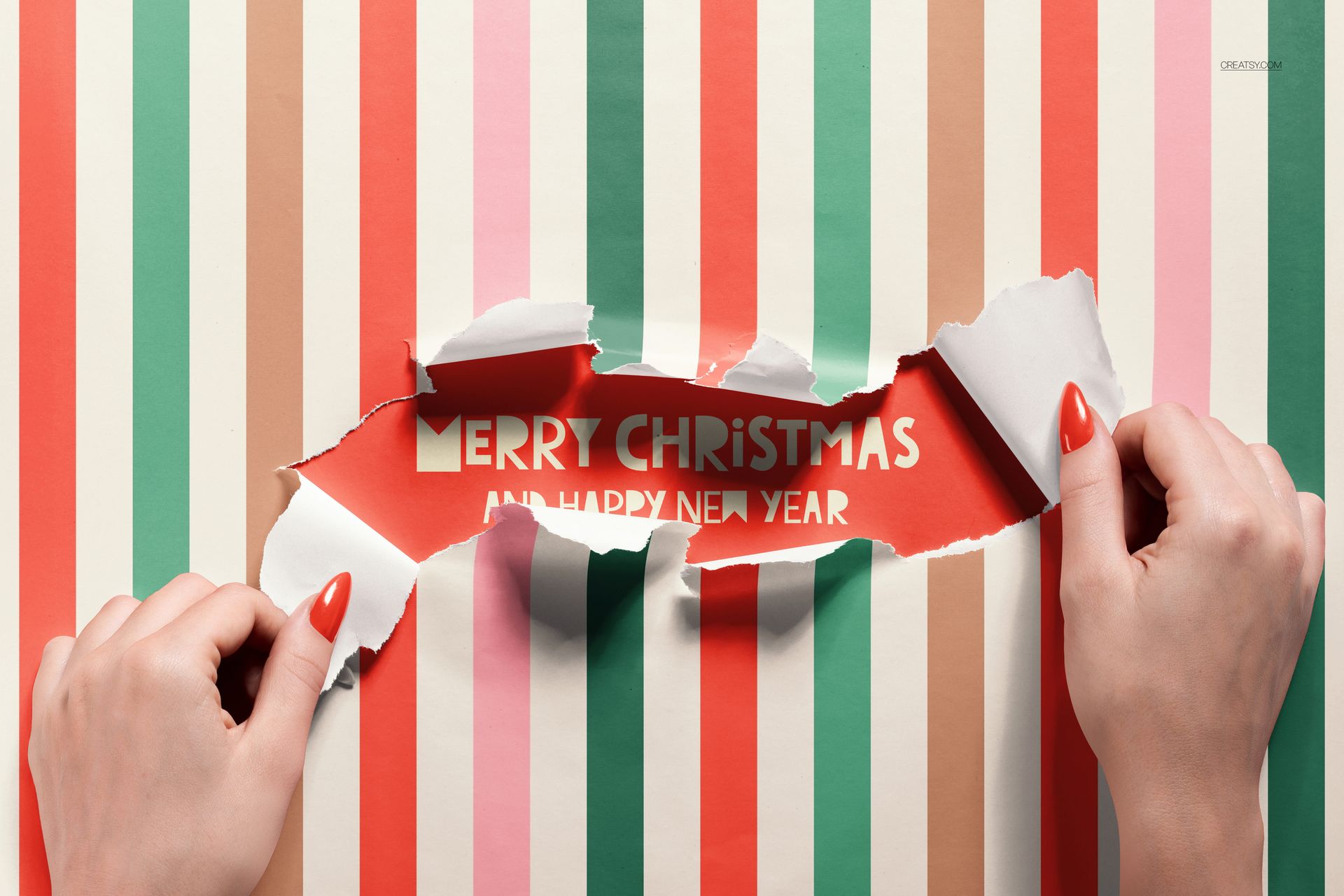Christmas gift wrapping mockup featuring torn striped paper and visible holiday greeting in bold white letters.