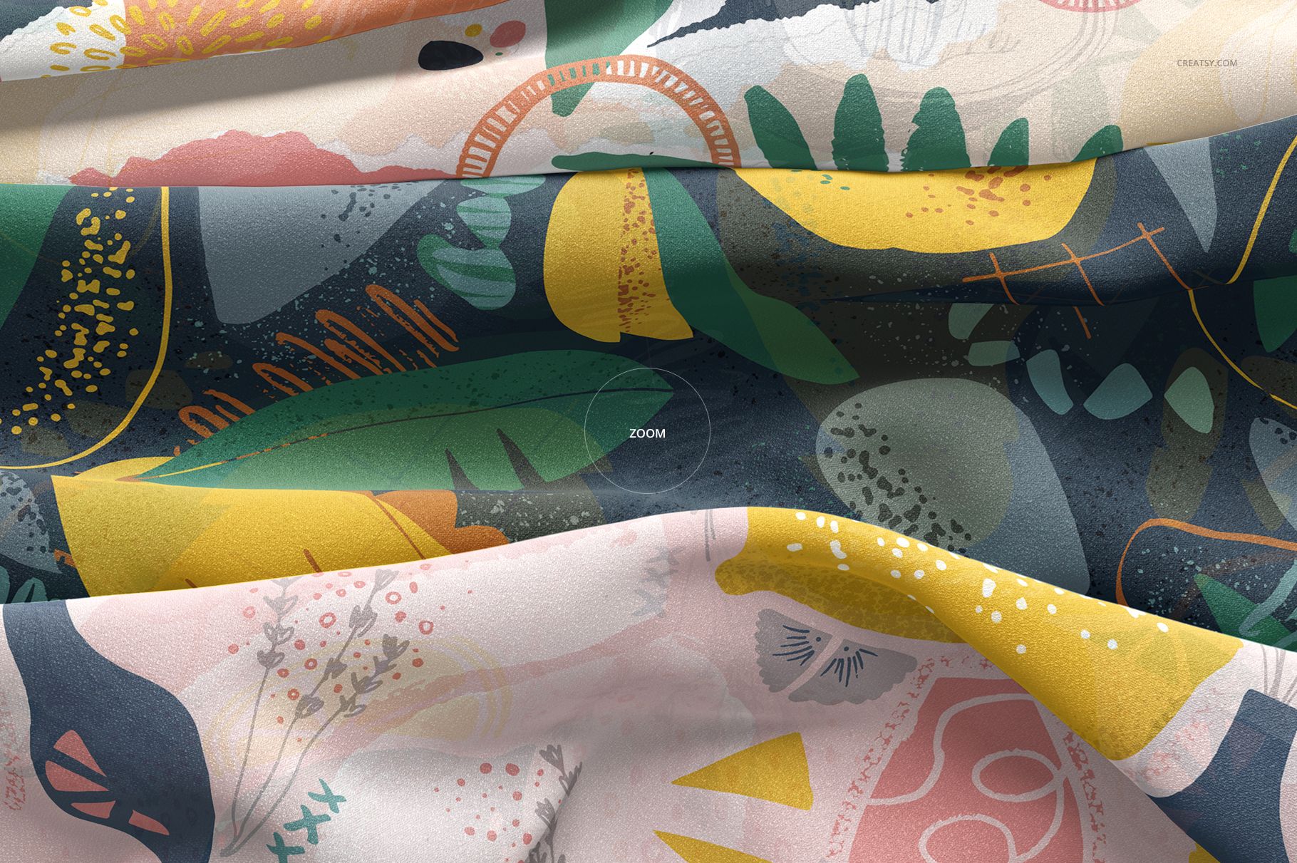 Detailed close-up of silk textile mockup featuring overlapping layers with multicolored abstract designs and soft folds.