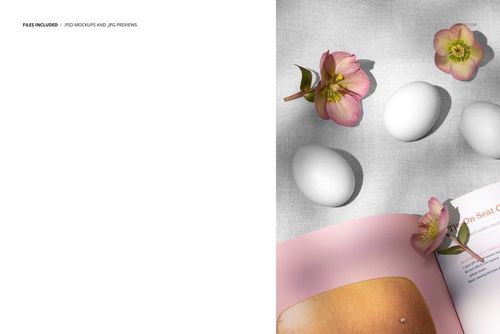 PSD mockup featuring a pink book, three plain white eggs, and pink blossoms arranged on a gray fabric background.