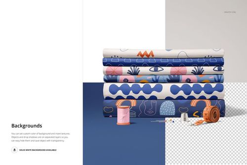 Folded fabrics mockup featuring various blue and orange designs, displayed with spools, thread, and thimble in front.