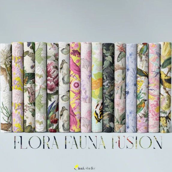 Folded fabrics mockup showing multiple fabric rolls standing upright, each with colorful floral and animal patterns on a light background.