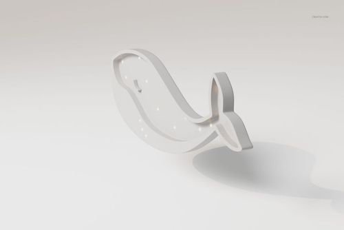 White whale-shaped wall lamp with a minimalist design, viewed from a front angle on a plain light background.