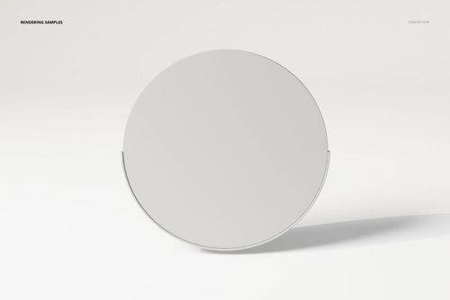 Round wall mirror with a minimalist frame displayed against a light neutral background, shown in front view.