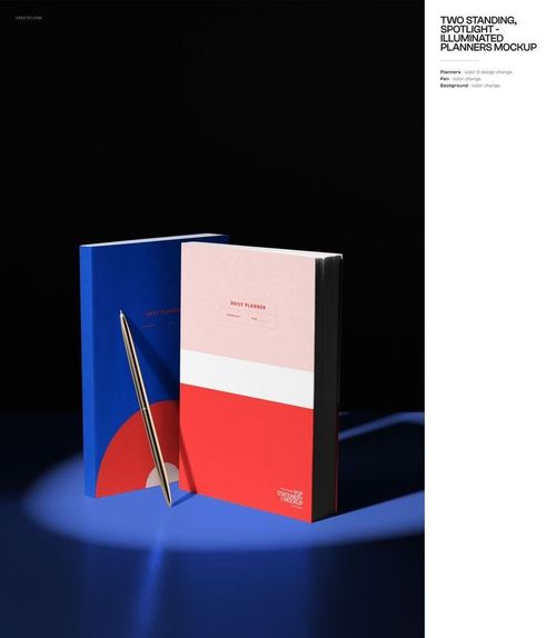 PSD mockup of two hardcover planners with modern geometric covers and a metallic pen, spotlighted against black.