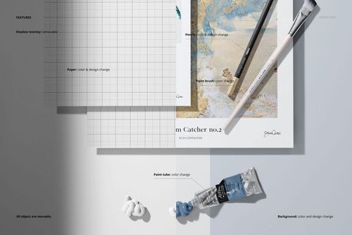 Top view of two rectangular paper pads, paint tubes, and a paintbrush on a neutral background, shown in a PSD mockup.