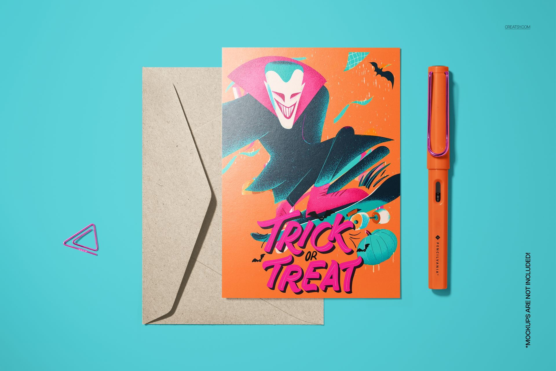 Halloween themed 5x7 card mockup with vibrant vampire illustration, orange background, and envelope on blue surface.