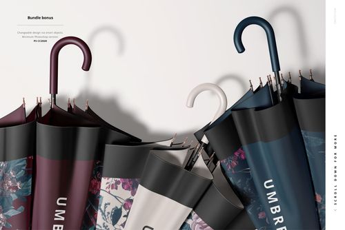 Front view of several umbrellas with floral and solid color patterns arranged in a row, shown as a mockup bundle.