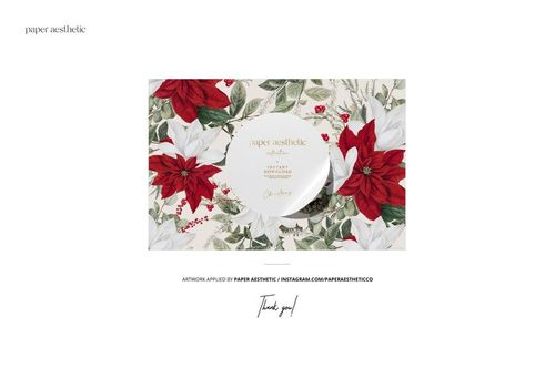 Disposable Christmas tableware mockup featuring a plate with red and white poinsettia floral pattern, top view.