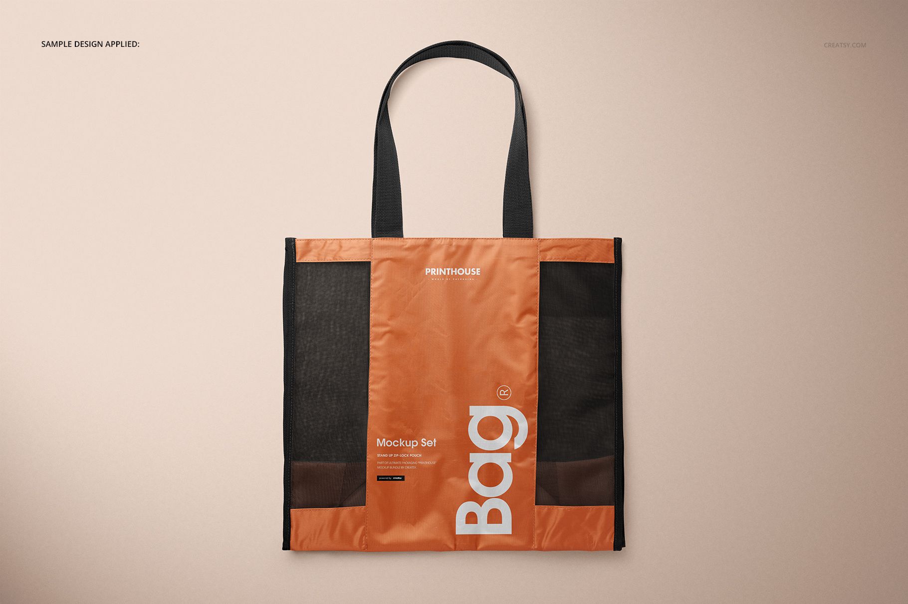Front view of a mesh shopping tote bag mockup featuring black mesh sides, orange center, and black handles.
