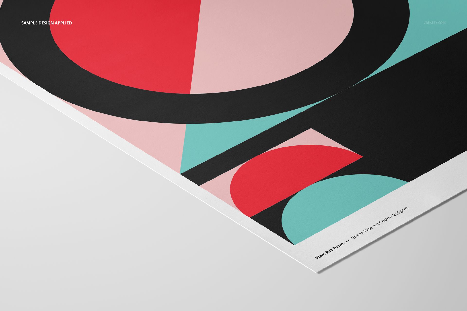 A3 fine art print mockup featuring geometric shapes in red, black, turquoise, and pale pink, angled on a white surface.