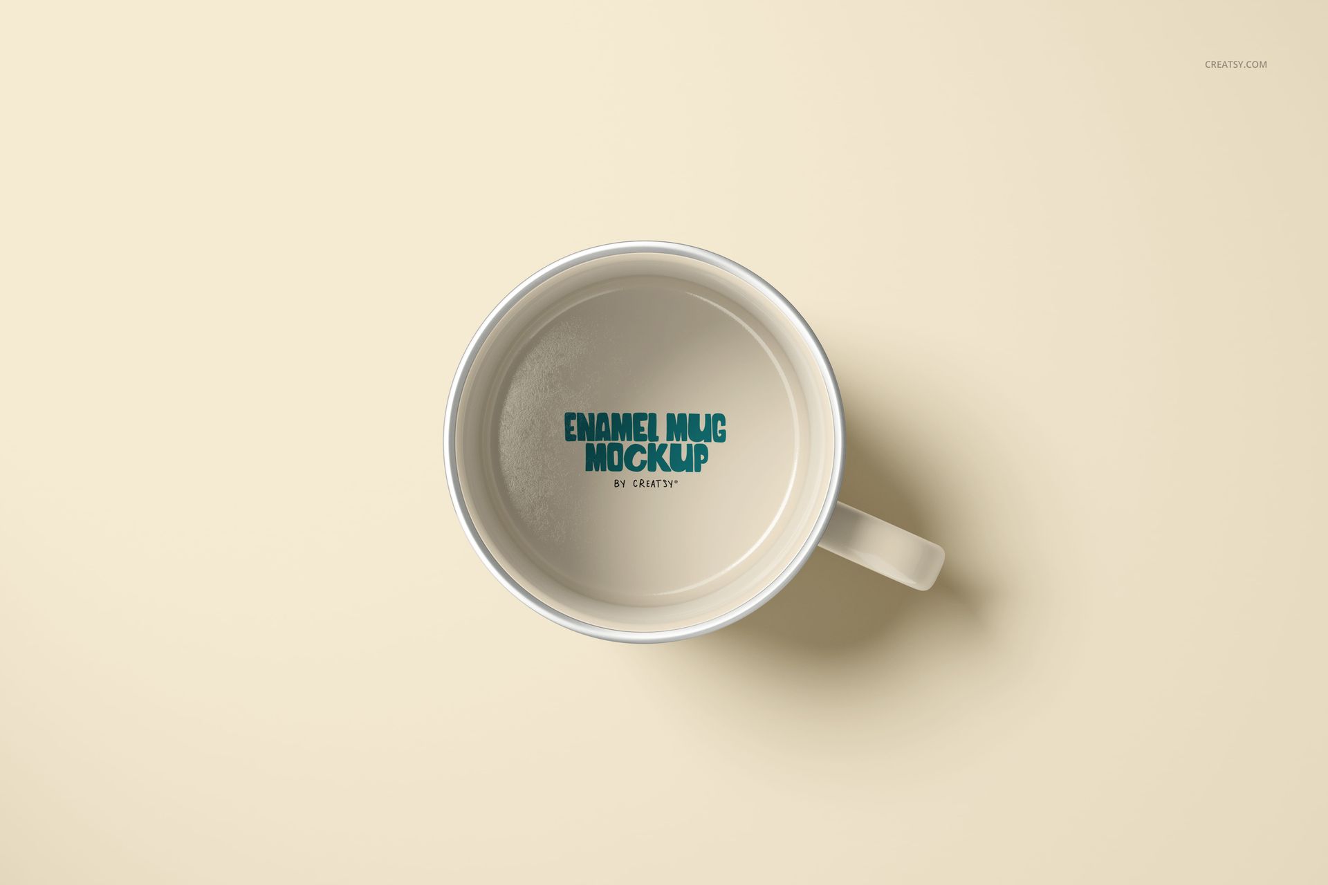 Enamel mug mockup shown from above, featuring a silver rim and plain light surface, handle on the right side.