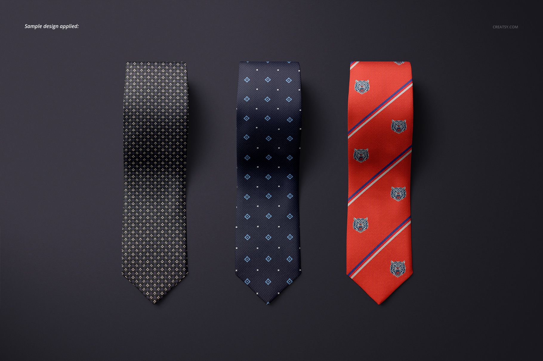 Tie mockup showing three different neckties with patterned motifs, presented in a top-down perspective on a dark surface.