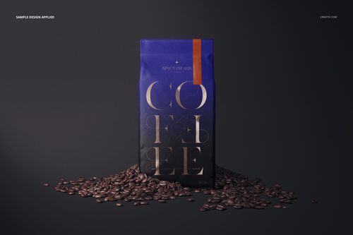 Front view of a matte coffee bag mockup with bold lettering, placed on a dark background with coffee beans.