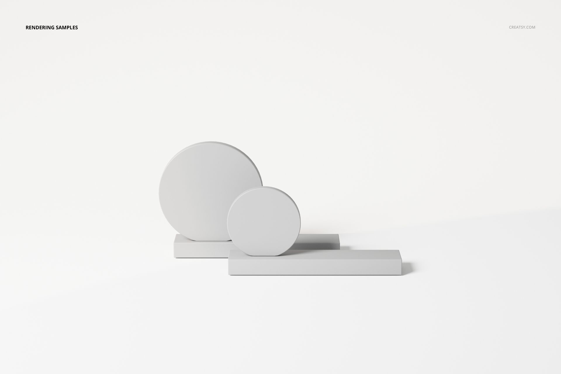 Abstract table decoration featuring two smooth circular shapes on rectangular bases, displayed on a white background.