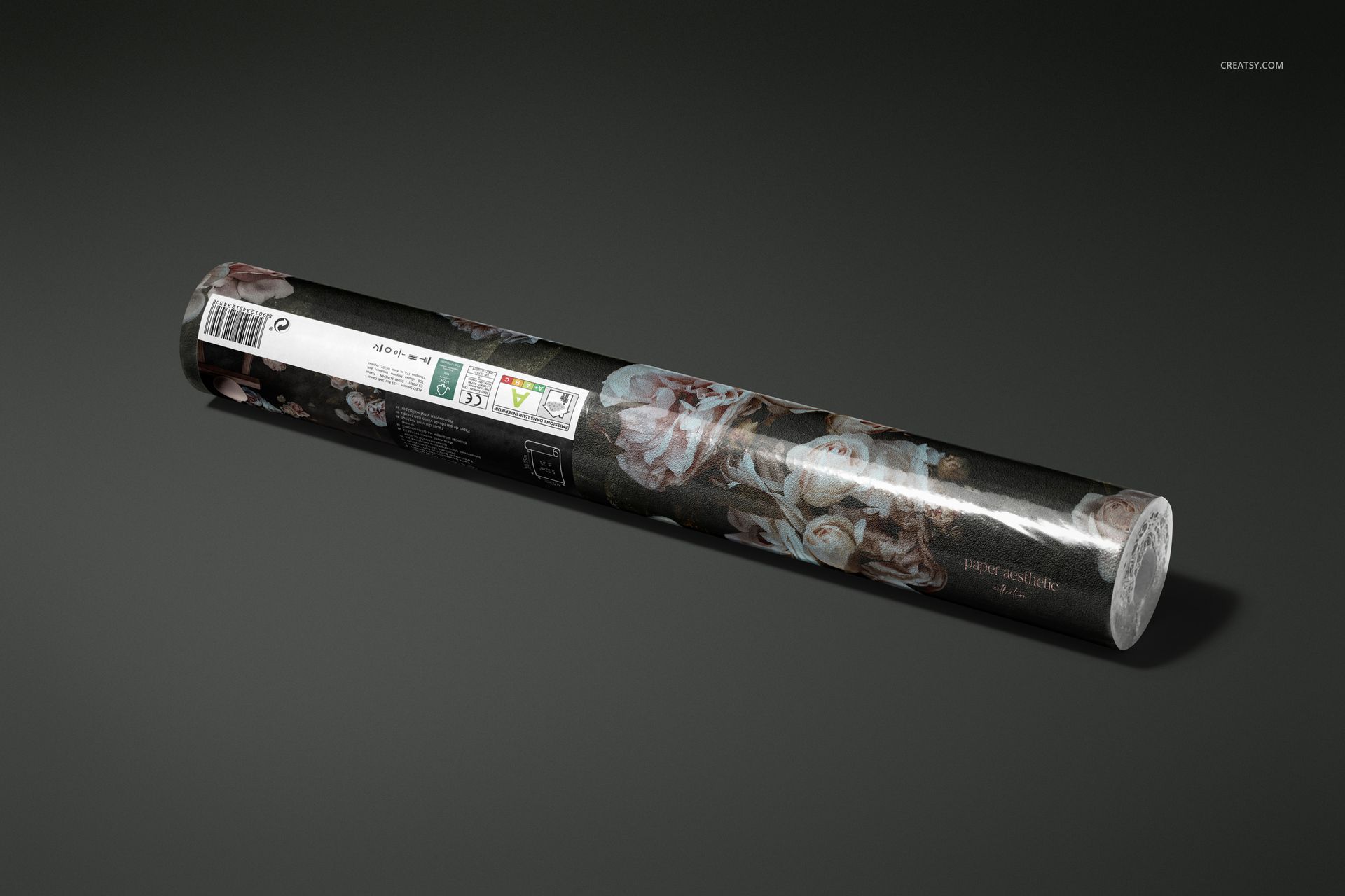 Mockup of a rolled vinyl wallpaper with muted floral design, shown from a diagonal angle against a dark background.