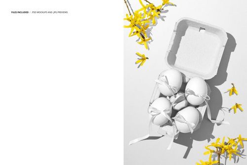 Open cardboard box containing four white Easter eggs with ribbons, displayed next to scattered yellow blossoms in a PSD mockup.