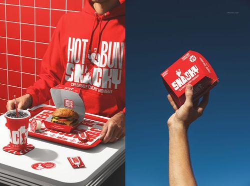 Fast food restaurant branding mockup featuring a burger box, drink cup, tray, and red hoodie in a dine-in scene.
