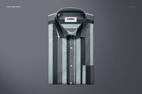 Folded shirt mockup featuring a striped pattern in gray and blue tones, shown from above on a neutral background.