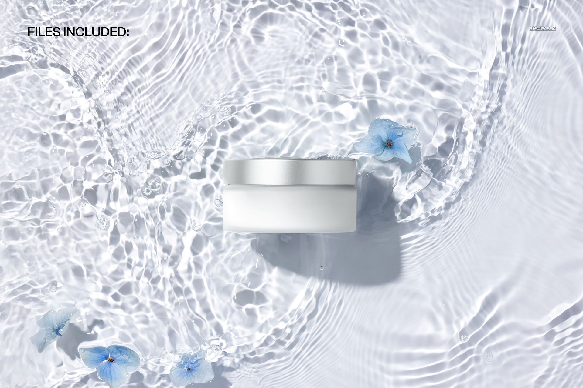 PSD mockup of a frosted cosmetic jar surrounded by delicate blue flowers and water ripples, seen from above.