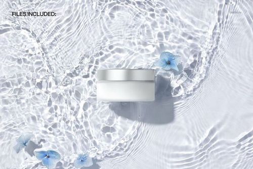 PSD mockup of a frosted cosmetic jar surrounded by delicate blue flowers and water ripples, seen from above.