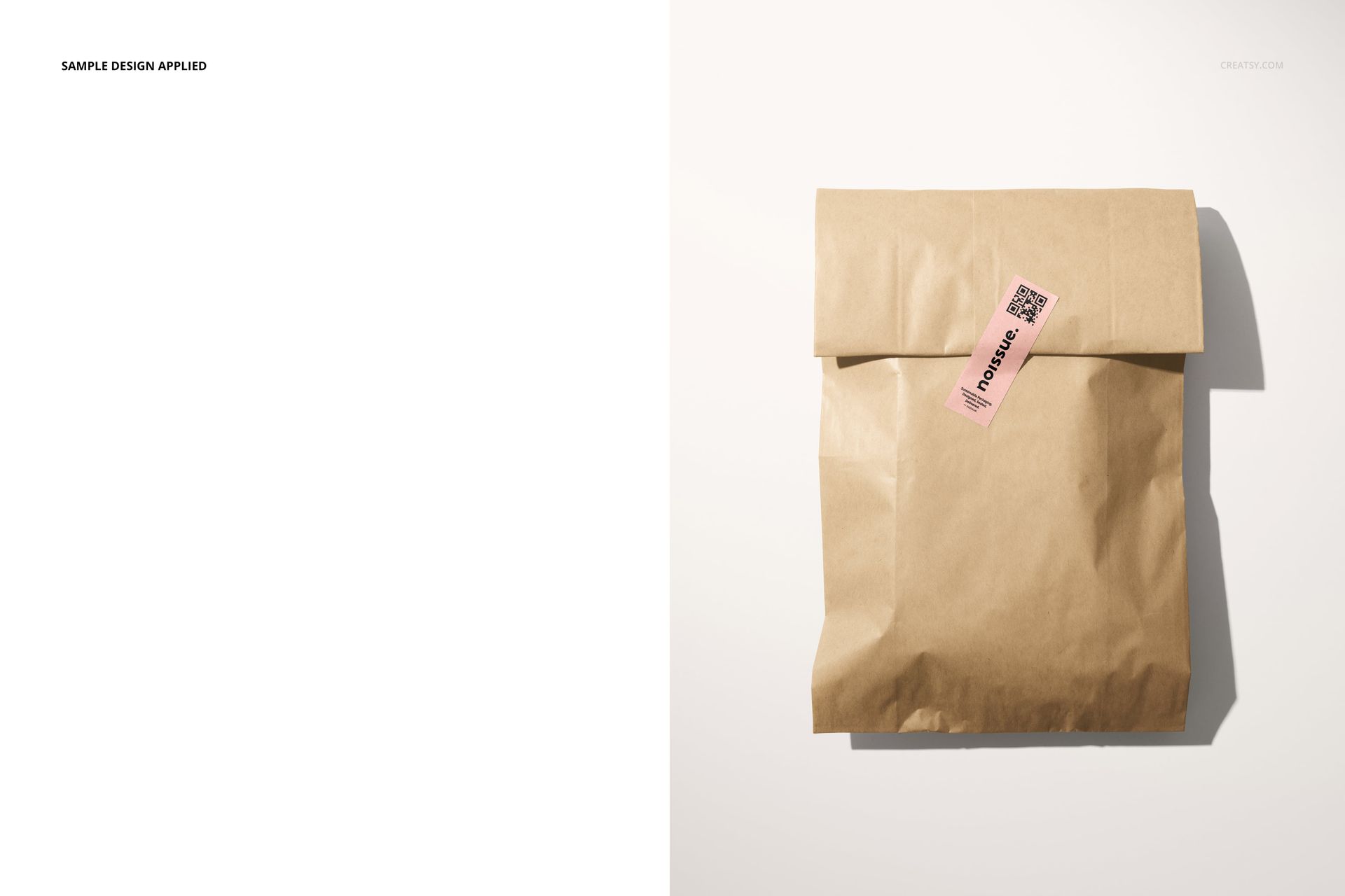 Brown paper bag with folded top and pink sticker label, displayed on a clean white surface, PSD mockup scene.