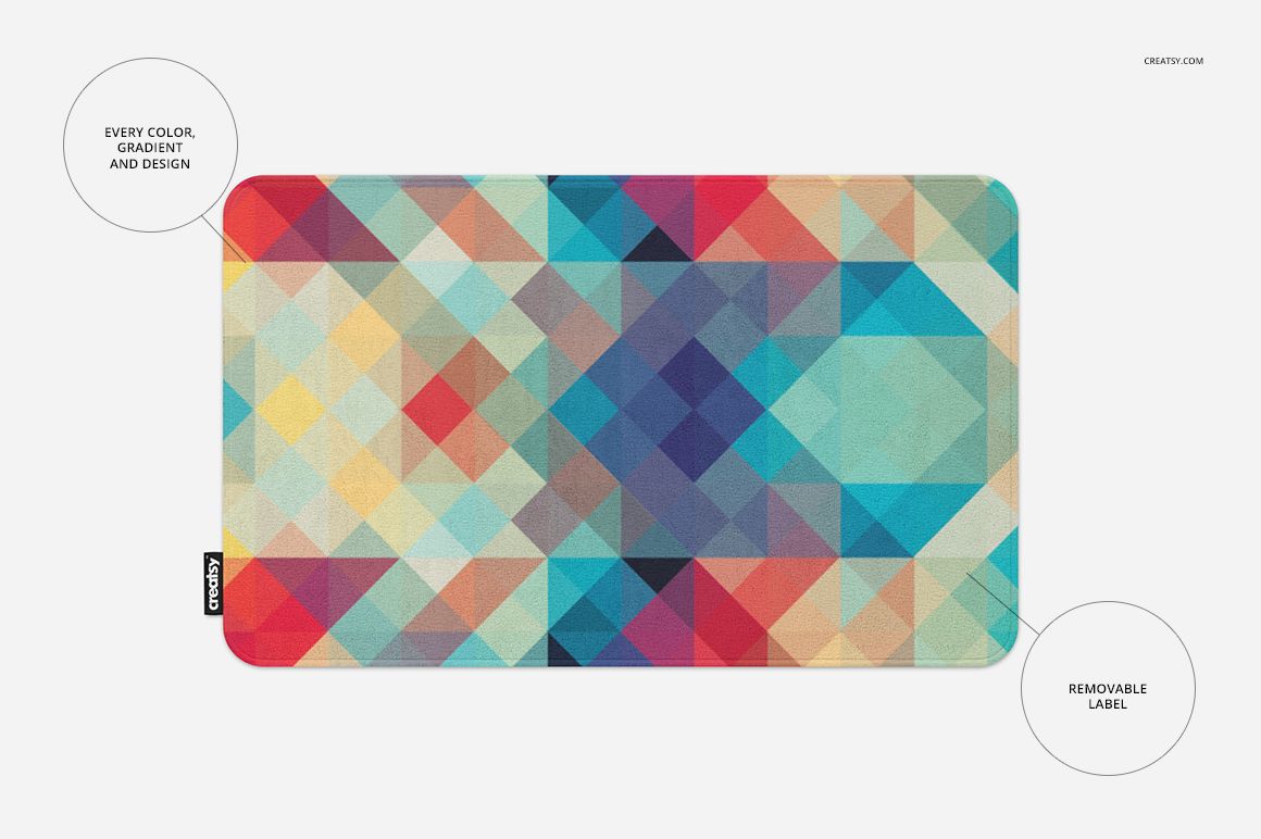 Round corners rug mockup displaying a vibrant, multicolored diamond and triangle pattern from a top-down perspective.