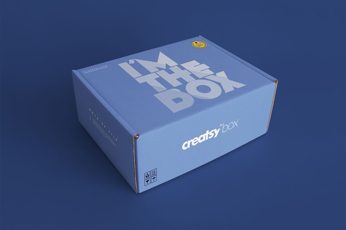 Blue mailing box mockup with bold white lettering and visible side details, displayed against a solid blue background.