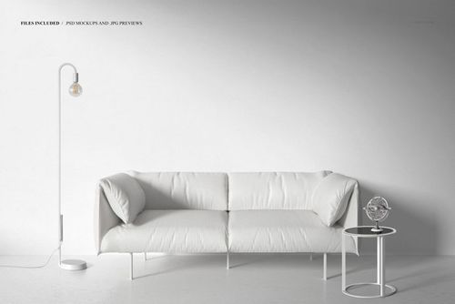 PSD mockup showing a modern living room setup with a white leather sofa, round table, and contemporary floor lamp.