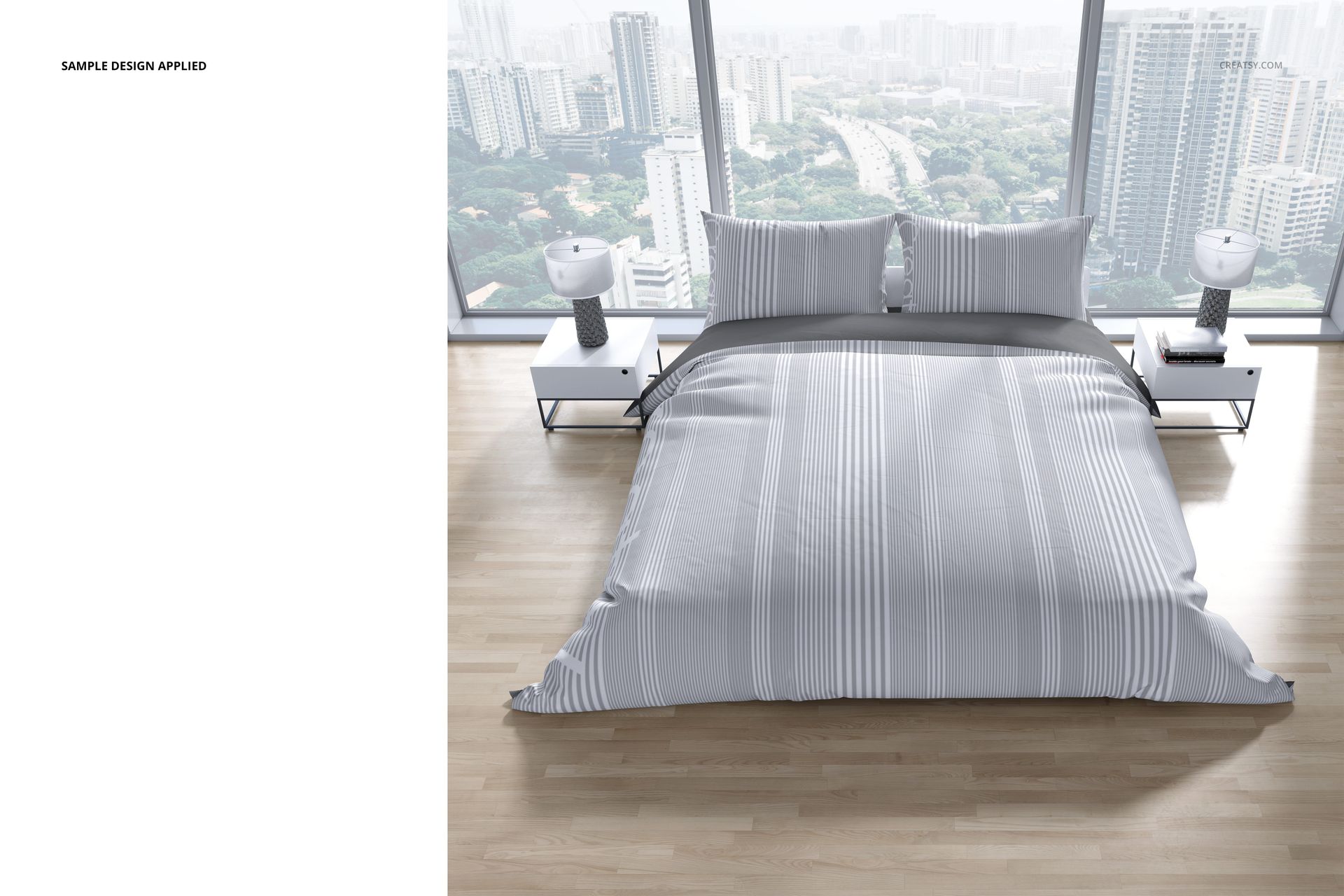 Front view of a bedding mockup set with a striped gray and white duvet and pillows in a modern bedroom.