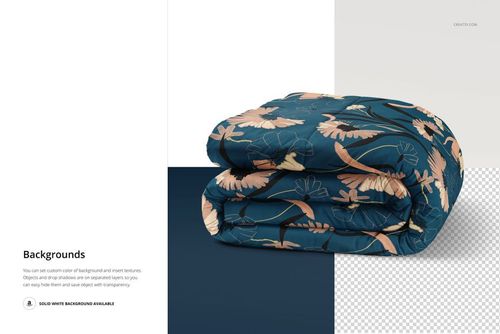 Folded microfiber comforter with a dark blue background and floral pattern, shown from a front angle on a mockup scene.