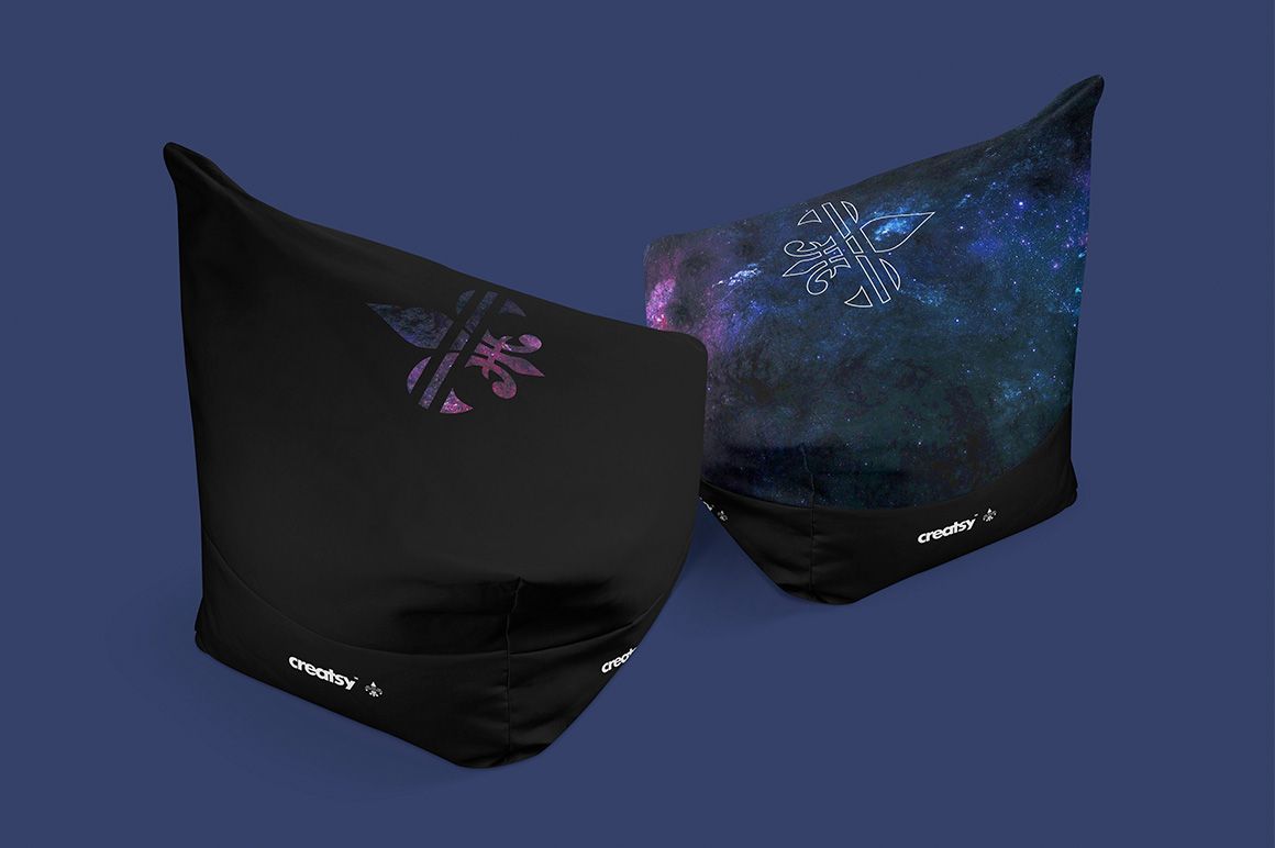 Front view of two bean bag mockups, one with a plain black cover and one featuring a colorful galaxy design, on blue.