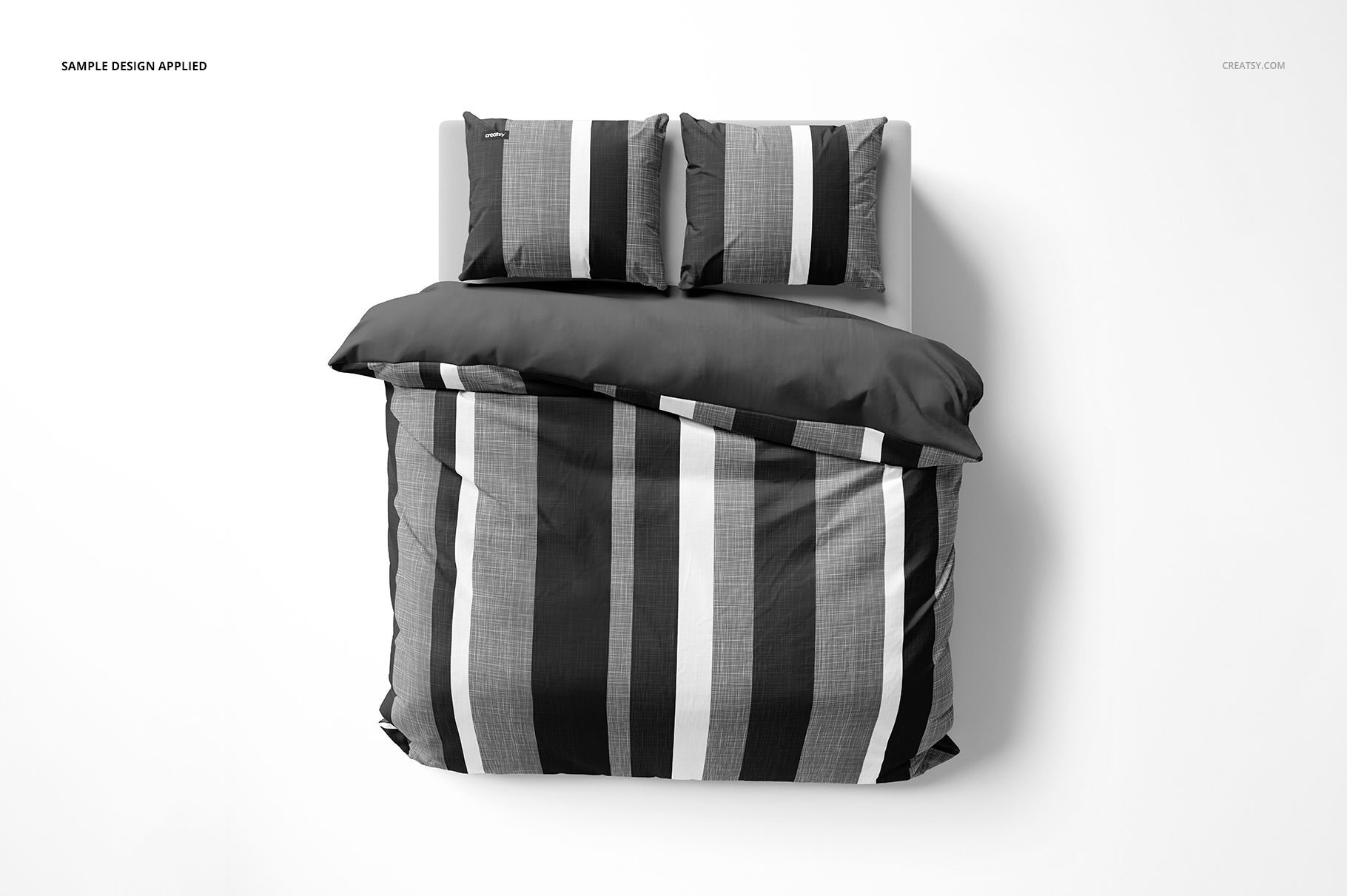 Top view of double bed bedding mockup with striped pattern in shades of black, gray, and white, including two pillows.