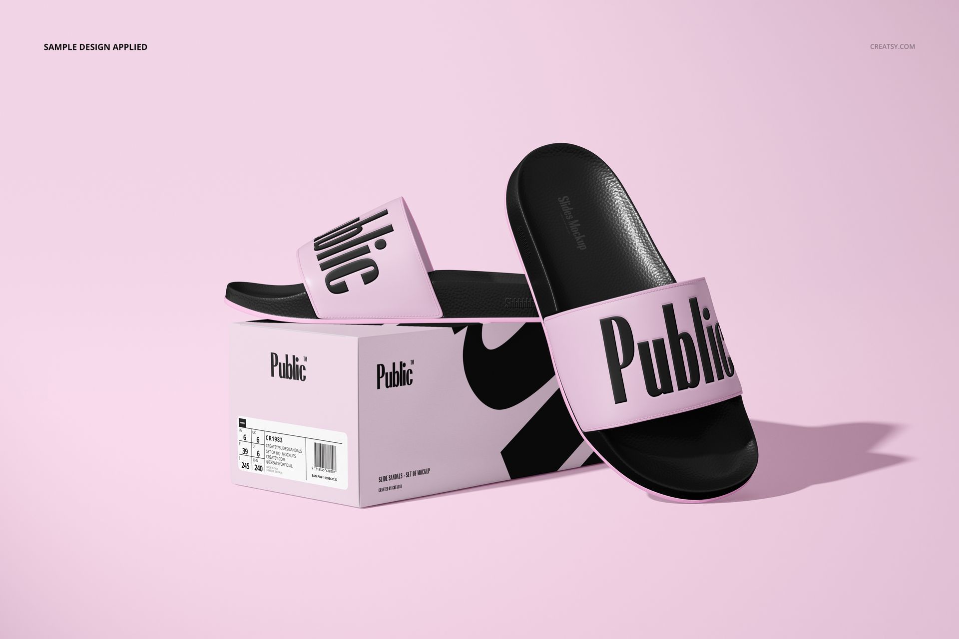 PSD mockup of slip-on sandals with black soles and pink straps with text, arranged next to a branded box on a light pink backdrop.