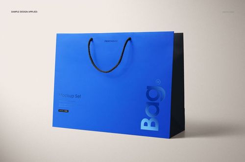Eurotote bag mockup in vivid blue with black rope handles, shown at an angle on a neutral background.