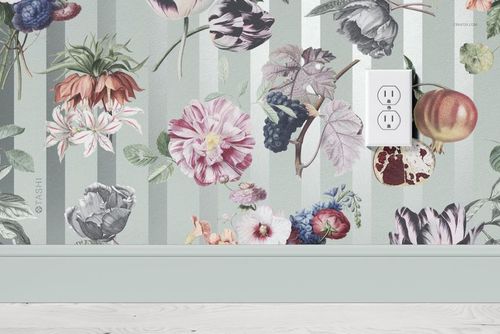 Floral paper wallpaper mockup featuring large, colorful flowers on striped background, viewed from a front angle in a room.