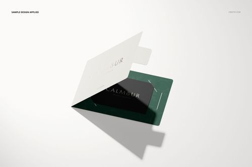 Gift card holder mockup featuring a white card and green holder with gold text, displayed on a light background.