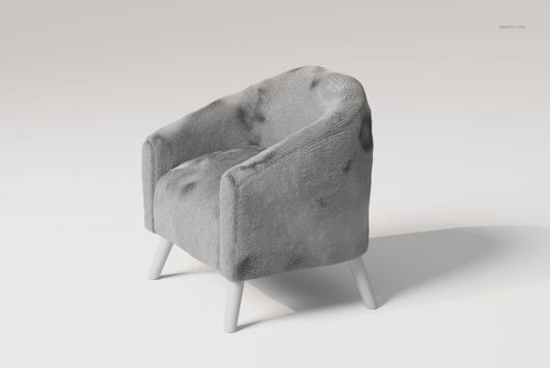 Gray lamb accent chair with soft, furry texture, rounded backrest, and white angled legs on a plain background.