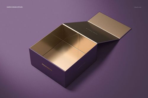 Magnetic gift box mockup with an open lid, showing gold interior and purple exterior on a matching surface.