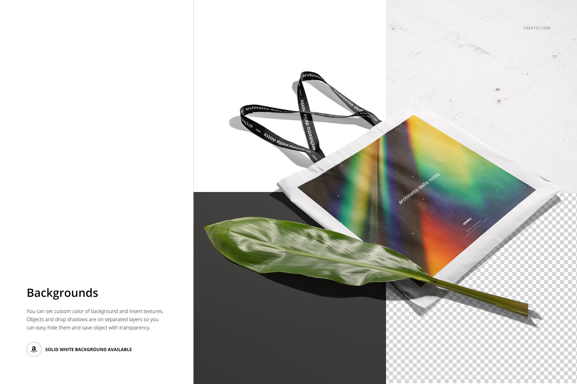 Front view of a tote bag mockup with black handles, featuring a colorful abstract design and a green leaf prop.