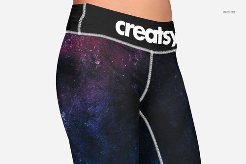 Front view of adult leggings mockup with a galaxy-inspired dark purple and blue pattern and black waistband on a white background.