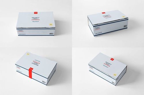 Mailing box PSD mockup featuring four views of rectangular boxes with simple graphics and a clean white backdrop.