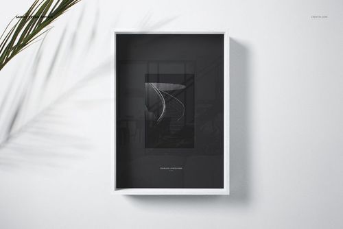 Front view of a wooden picture frame mockup with a dark minimalist artwork, displayed against a white wall.
