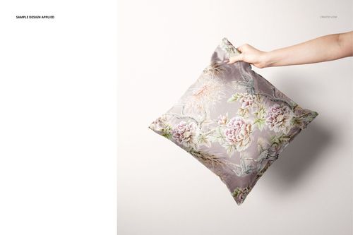 Front view of a decorative cushion cover featuring a muted floral design, displayed in a PSD mockup setting.