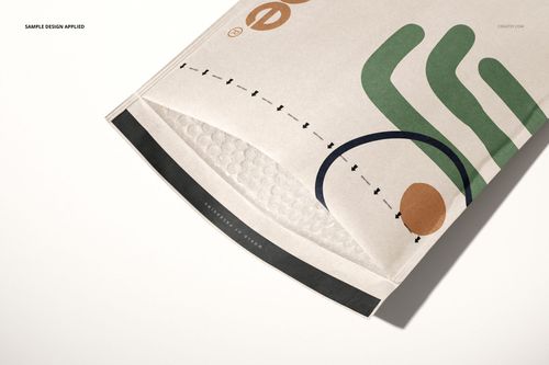 Close-up of kraft bubble mailer mockup featuring a colorful abstract pattern and visible bubble lining inside.