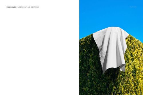 White cotton fabric draped over a green hedge with a clear blue sky in the background, front view mockup.