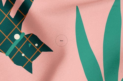 Close-up of a pet bandana mockup featuring a pink fabric with green geometric cat and leaf illustrations.